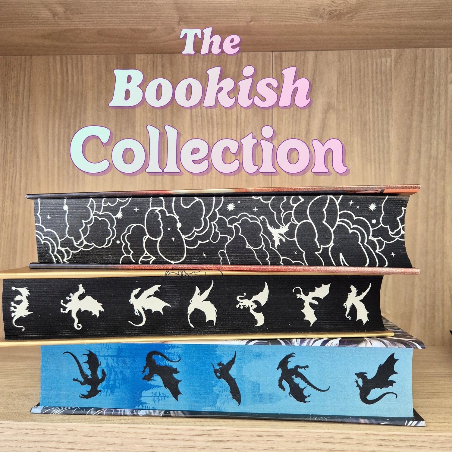 Stack of books with fantasy-themed 3D printed dragons, keychains, and book ends – The Bookish Collection by Printed Fantasy NZ