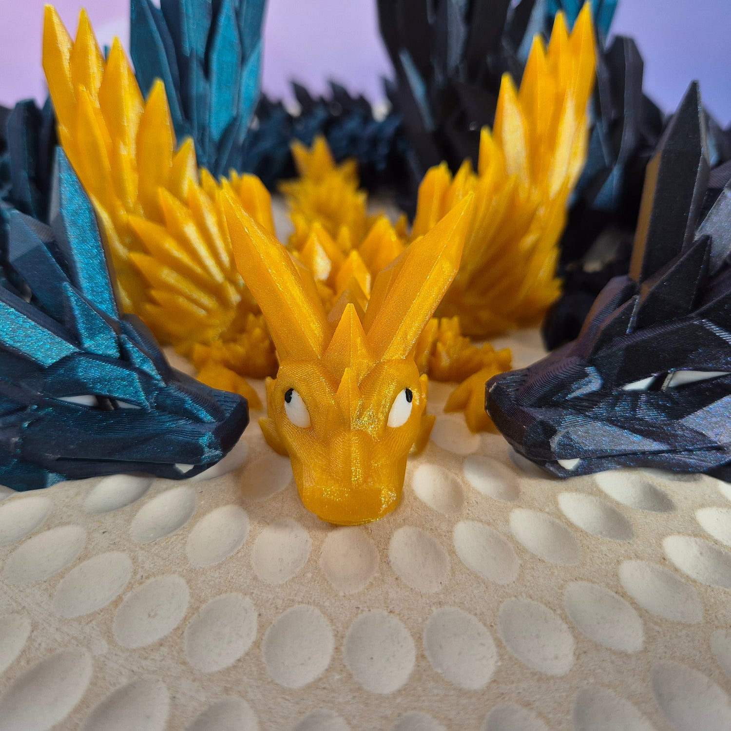 Close up of 3d printed book dragons

